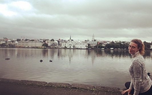 Me at Tjornin lake while visiting Reykjavik in One Day