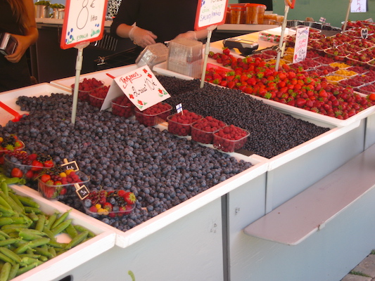 Berries in one of the stalls of the outside market in Kauppatori in Helsinki